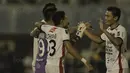 Kiper Bali United, Wawan Hendrawan, merarayakan kemenangan atas Madura United pada laga Piala Presiden di Stadion Manahan, Solo, Sabtu, (3/2/2018). Bali United menang adu penalti dengan skor 5-4. (Bola.com/M Iqbal Ichsan)