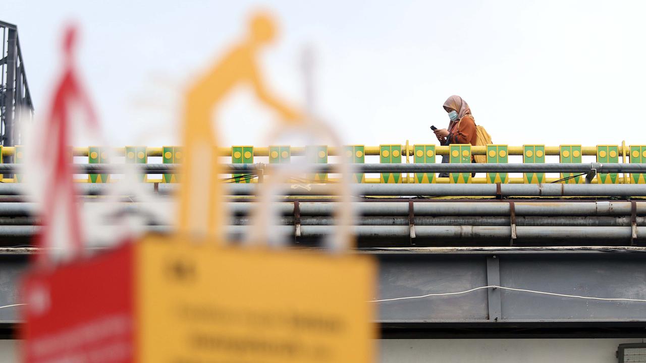 FOTO: Pemberlakuan Pembatasan Kegiatan Masyarakat di Jawa - Bali Diperpanjang