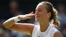 Pada 2011 petenis Republik Cheko, Petra Kvitova  merebut gelar Wimbledon setelah mengalahkan Maria Sharapova 6-3, 6-4 di Final. (AFP/Adrian Dennis)