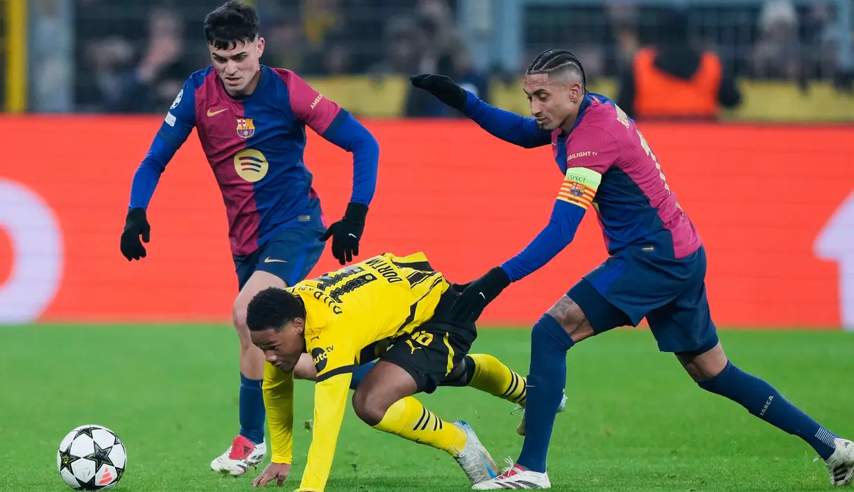 Kemenangan ini membuat Barcelona naik ke peringkat kedua klasemen sementara Liga Champions dengan torehan 15 poin dari enam pertandingan, berjarak tiga poin dari Liverpool di posisi pertama. (AP Photo/Martin Meissner)