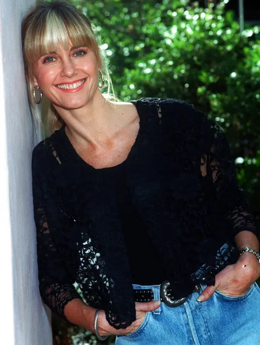 <p>Olivia Newton-John pada 1990. (AP Photo/Julie Parkes, File)</p>