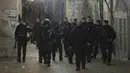 <p>Polisi Israel dikerahkan di Kota Tua Yerusalem setelah terjadi penembakan di kompleks Masjid Al-Aqsa selama bulan suci Ramadhan, Sabtu, 1 April 2023. (AP Photo/ Mahmoud Illean)</p>
