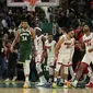 Selebrasi pemain Miami Heat usai menyingkirkan Milwaukee Bucks (AFP)