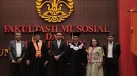 Analis pemasyarakatan dan pakar deradikalisasi BNPT, Ardi Putra Prasetya saat menerima gelar doktor Kriminologi Universitas Indonesia. (Liputan6.com/Dicky Agung Prihanto)