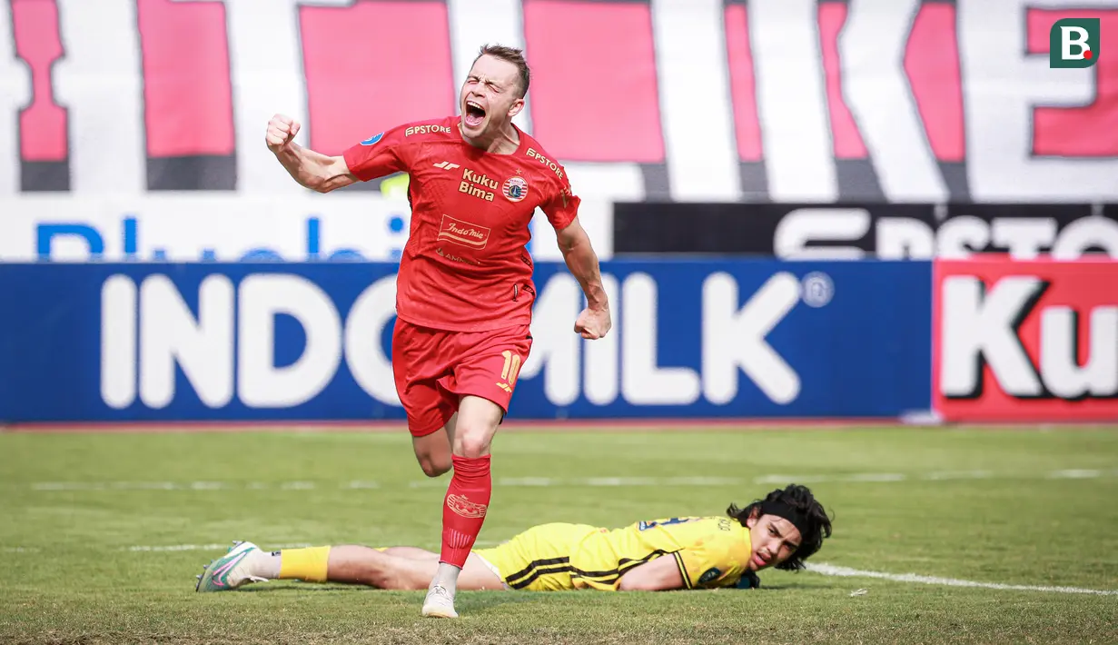 <p>Selebrasi pemain Persija Jakarta, Maciej Jacek Gajos, setelah menjebol gawang Arema FC dalam pertandingan pekan kesembilan BRI Liga 1 2023/2024 yang berlangsung di Stadion Patriot Candra Bhaga, Bekasi, Minggu (20/9/2023). (Bola.com/Bagaskara Lazuardi)</p>