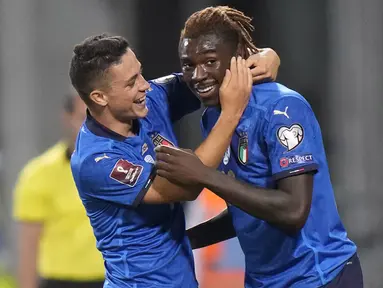 Italia berhasil menekuk Lithuania pada laga lanjutan grup C kualifikasi Piala Dunia 2022 zona Eropa dengan skor telak 5-0. Rekrutan anyar Juventus, Moise Kean terpilih menjadi man of the match pada laga tersebut. (Foto: AP/Luca Bruno)