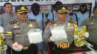 Kepolisian Resor Kota Pekanbaru mengungkap penangkapan sindikat peredaran narkoba, Jumat, 29 Juni 2018. (Riauonline.co.id)