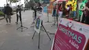 Paduan suara Christmas Carol menghibur pengguna jalan di pedestrian kawasan Sudirman, Jakarta, Rabu (18/12/2019). Acara ini berlangsung pada tanggal 18-20 Desember 2019 mulai pukul 17.00-19.00 WIB. (Liputan6.com/Herman Zakharia)