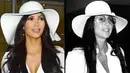 Kim Kardashian selalu percaya diri dalam meniru gaya Cher. Memang sama-sama cantik ya! (Getty Images/USWeekly)