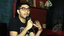 Gandhi Fernando pada acara press screening film Tuyul di Cinema XXI Setiabudi Building, Jakarta Selatan, Rabu (8/4/2015). Film ini akan menjadi trilogi dengan disutradarai oleh Billy Christian (Liputan6.com/Helmi Afandi)