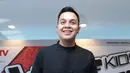 Tulus ternyata tidak bisa hadir di pesta pernikahan Raisa dan Hamish. Ditemui di kawasan Kebon Jeruk, Jakarta Barat, Rabu (30/8/2017), Tulus menceritakan alasannya tidak bisa hadir lantaran bersamaan dengan jadwal manggungnya. (Deki Prayoga/Bintang.com)