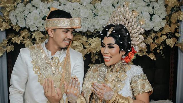 evi masamba dan suami