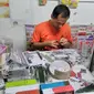 Pelaku seni kreatif yang pembuat miniatur dengan papercraft. (Dok. IST)