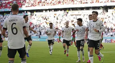 Tim Jerman merayakan gol kedua ke gawang Portugal pada pertandingan grup F Euro 2020  di Allianz Arena, Munich, Sabtu (19/6/2021). Jerman menang telak atas Portugal dengan skor 4-2. (AP Photo/Matthias Schrader, Pool)