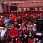 Calon Presiden Joko Widodo dan cawapres Ma'ruf Amin duduk di bangku depan bersama Megawati Soekarnoputri dalam perayaan HUT PDIP. (Liputan6.com/Putu Merta Surya Putra)