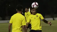 Pemain Timnas Malaysia, Safawi Rasid, saat latihan jelang laga kualifikasi Piala Dunia di Lapangan ABC, Senayan, Jakarta, Selasa (3/9). Malaysia akan berhadapan dengan Indonesia. (Bola.com/M Iqbal Ichsan)