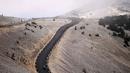 Melintasi panorama ikonik, Pegunungan Ventoux, Wout Van Aert mapu melahap balapan sejauh 198,9 km dengan catatan waktu 5 jam 17 menit 43 detik. (Foto: AFP/Anne-Christine Poujoulat)