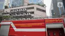 Suasana Gedung Kementerian Hukum dan Hak Asasi Manusia Republik Indonesia (Kemenkumham) seusai peristiwa kebakaran di Jalan Rasuna Said, Kuningan Jaksel, Kamis (8/12/2022). Tidak korban jiwa maupun luka dalam kejadian tersebut. Para karyawan sudah dievakuasi begitu kebakaran terjadi. (Liputan6.com/Faizal Fanani)