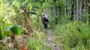 Pebalap sepeda mengikuti kejuaraan Mountain Bike Cross Country Marathon (MTB XCM) di Kawasan Tanjung Lesung, Pandeglang, Banten, Sabtu (29/9). Kejuaraan lintas alam tersebut berlangsung dari 28 hingga 30 September 2018. (Liputan6.com/HO/Nick)