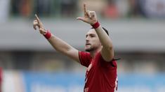 Striker Persija Jakarta, Marko Simic, melakukan selebrasi usai membobol gawang PSIS Semarang pada laga Liga 1 di Stadion Patriot, Bekasi, Minggu (15/9). Persija menang 2-1 atas PSIS. (Bola.com/M Iqbal Ichsan)