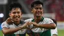 Timnas Indonesia memang gagal memetik kemenangan di leg pertama semifinal Piala AFF 2020 kontra Singapura. Namun hasil imbang 1-1 telah mencatat kemampuan skuat Garuda melaui rapor usai laga yang dapat jadi acuan untuk leg kedua. Seperti apa rapornya? Simak yuk! (AFP/Roslan Rahman)