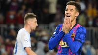 Philippe Coutinho membuat kejutan dengan kembali bermain di Liga Inggris bersama Aston Villa. The Villans diketahui harus menghabiskan dana 18 juta euro untuk mendatangkan pemain 29 tahun tersebut dari Barcelona dengan status pinjaman dengan opsi pembelian di akhir musim. (AFP/Lluis Gene)