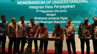 MoU integrasi data perpajakan PT Pegadaian dengan Ditjen Pajak Kemenkeu (Foto:Merdeka.com/Anggun P.Situmorang)