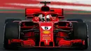 Pembalap Jerman, Sebastian Vettel memacu mobil tim Ferrari pada hari ketiga tes pramusim F1 di Sirkuit Catalunya, Barcelona, Kamis (8/3). Tapi, ini adalah rekor tidak resmi karena catatan waktu yang dibuat selama tes tidak diakui. (AP/Manu Fernandez)