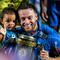 Selebrasi gelandang Persib Bandung, Marc Klok dengan trofi juara bersama sang putri, Sage Luan Klok dalam perayaan gelar juara Championship Series BRI Liga 1 2023/2024 setelah mengalahkan Madura United 3-1 pada laga final leg kedua di Stadion Gelora Bangkalan, Madura, Jumat (31/5/2024). (Bola.com/Bagaskara Lazuardi)