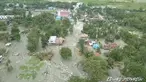 Pandangan umum menunjukkan dampak banjir bandang yang menerjang Distrik Sentani, Kabupaten Jayapura, Papua, Minggu (17/3). Berdasarkan data BNPB, banjir bandang pada Sabtu (16/3) itu mengakibatkan 58 orang meninggal. (Edward Hehareuw/via REUTERS)