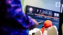 Pada perdagangan perdana di tahun 2024 Indeks Harga Saham Gabungan (IHSG) dibuka mengalami penurunan sebesar 0,14 persen atau 5,4 poin ke level 7.266. (Liputan6.com/Faizal Fanani)