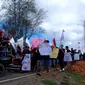 Ratusan buruh perkebunan dan pabrik kelapa sawit menggelar aksi hari buruh internasional atau may day di Kabupaten Mukomuko (Liputan6.com/Yuliardi Hardjo) 