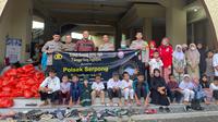 Dewan Pimpinan Cabang (DPC) Kongres Advocat Indonesia Kota Tangerang Selatan mengadakan kegiatan sosial buka puasa bersama anak yatim. (Liputan6.com/Pramita Tristiawati)