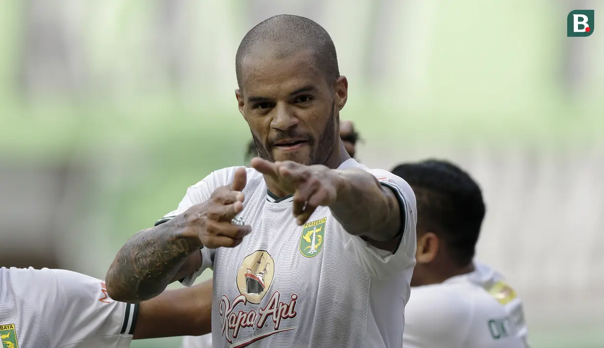 Selebrasi striker Persebaya Surabaya, David da Silva, setelah mencetak gol ke gawang Bhayangkara FC di Stadion Madya, Jakarta, Sabtu (31/8/2019). (Bola.com/Yoppy Renato)