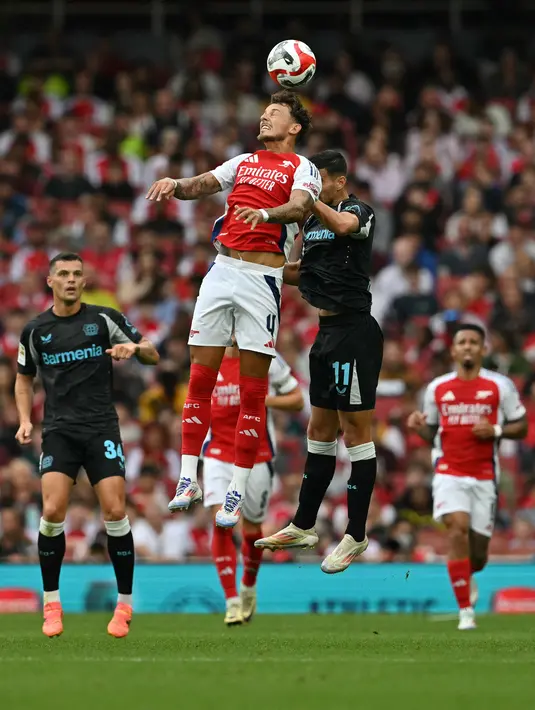 Sementara kubu Bayer Leverkusen hanya mencetak gol hiburan lewat aksi Adam Hlozek pada menit ke-76. (Glyn KIRK / AFP)