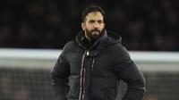 Ekspresi kecewa pelatih Manchester United, Ruben Amorim setelah laga lanjutan Liga Inggris 2024/2025 melawan Arsenal di Emirates Stadium, London, Inggris, Kamis (05/12/2024) WIB. (AP Photo/Kirsty Wigglesworth)