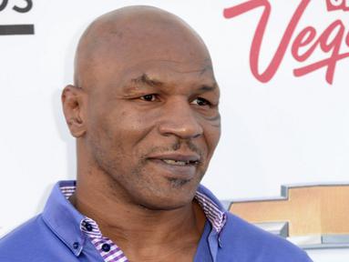 Mike Tyson merupakan mantan atlet tinju yang sangat disegani oleh lawan – lawannya, kehidupannya yang  mewah kini telah sirna. Menurut The New York Times, utang Tyson mencapai Rp 207 miliar, belum dengan pajak lainnya. (AFP/JASON MERRITT) 