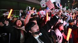 Presiden Korea Selatan yang dimakzulkan, Yoon Suk Yeol, dibebaskan dari tahanan pada tanggal 8 Maret 2025. (Jung Yeon-je/AFP)