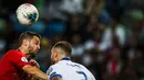 Pemain depan timnas Portugal, Bernardo Silva berebut bola dengan bek Luksemburg, Maxime Chanot dalam laga lanjutan Grup B Kualifikasi Piala Eropa 2020 di Estadio Jose Alvalade, Jumat (11/10/2019). Portugal meraih kemenangan 3-0 atas tamunya, Luksemburg. (CARLOS COSTA/AFP)