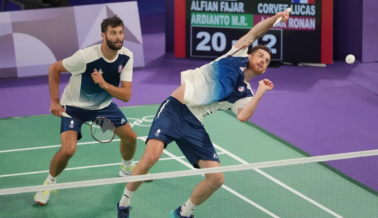 Lucas Corvee/Ronan Labar harus mengakui keunggulan Fajar Alfian/Muhammad Rian Ardianto dengan skor 13-21 dan 10-21. (AP Photo/Dita Alangkara)