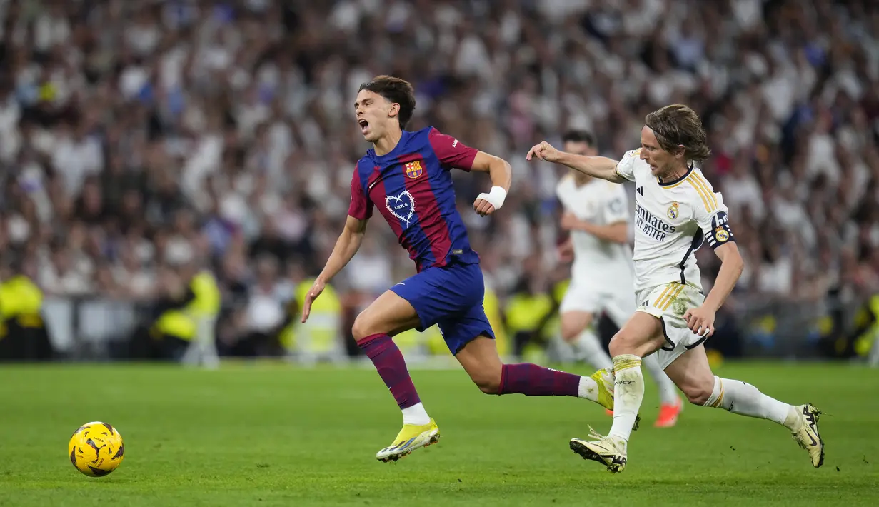 Real Madrid sukses menaklukkan rival abadinya Barcelona 3-2 di laga klasik El Clasico. (AP Photo/Manu Fernandez)