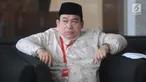 Pihak pengelola pesantren, HMN Lesmana berada di ruang tunggu untuk menjalani pemeriksaan di Gedung KPK, Jakarta, Rabu (26/6/2019). Lesmana diperiksa sebagai saksi terkait kasus dugaan penyunatan anggaran dan gratifikasi yang menyeret  mantan Bupati Bogor Rachmat Yasin. (merdeka.com/Dwi Narwoko)