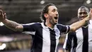 West Bromwich Albion&#039;s midfielder Jonathan Greening celebrates after scoring the opening goal during the English Premier league football match against Portsmouth at The Hawthorns on December 7, 2008. AFP PHOTO/ANDREW YATES