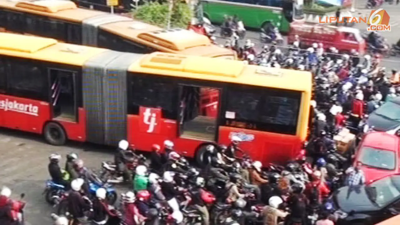 harga-transjakarta-140220b.jpg
