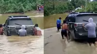 Mobil diangkat melewati banjir (Instagram/@gharymeo)
