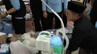 Menteri Agama Lukman Hakim Saifuddin menengok jemaah haji Indonesia. (www.kemenag.go.id)