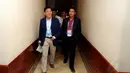 Presiden Persija Jakarta, Ferry Paulus (kiri) bersiap masuk ke dalam ruang Kongres Tahunan PSSI di Hotel Borobudur, Jakarta (4/1/2015). (Liputan6.com/Helmi Fithriansyah)