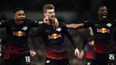 Saat menjamu Totteham di Red Bull Arena, Leipzig kembali membuat klub Inggris itu semakin merana dengan tiga gol tanpa balas. Leipzig mampu menyingkirkan Spurs dengan kemenangan agregat 4-0. (AFP/Glyn Kirk)