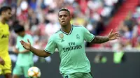 Penyerang Real Madrid, Mariano Diaz berselebrasi usai mencetak gol ke gawang Fenerbahce pada pertandingan Audi Cup 2019 di stadion Allianz Arena di Munich, Jerman (31/7/2019). Madrid menang atas Fenerbache dengan skor 5-3. (AP Photo/Matthias Schrader)