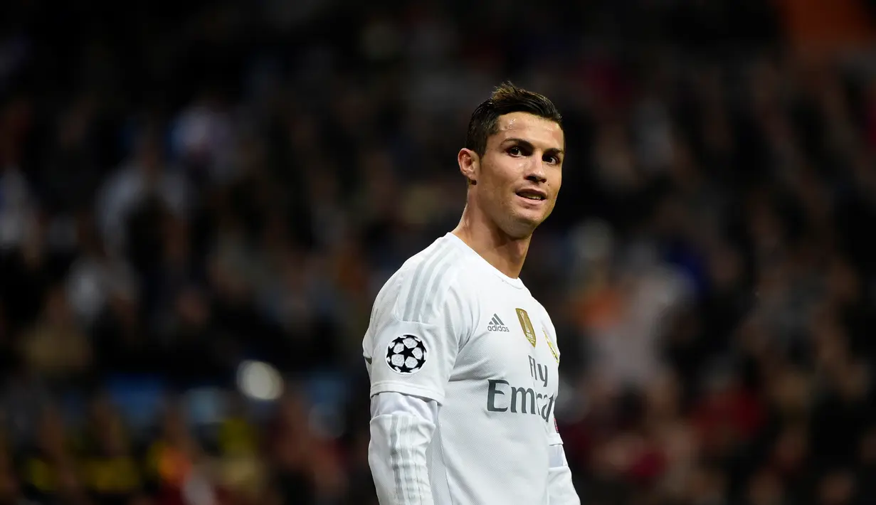 Cristiano Ronaldo tidak hanya tampan tapi juga memiliki segudang prestasi sebagai pesepak bola. (AFP/Pierre-Philippe Marcou)